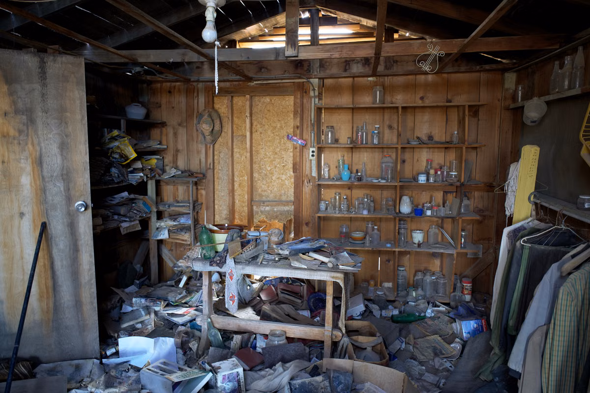 Dusty room with accumulated clutter illustrating hoarder cleanouts (stock photo)